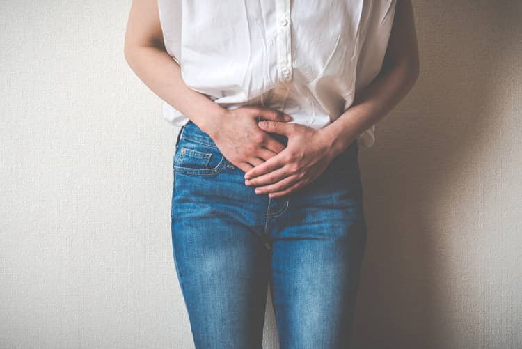 Pain in the lower abdomen as a symptom of pregnancy