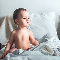 11-month-old baby in a bed
